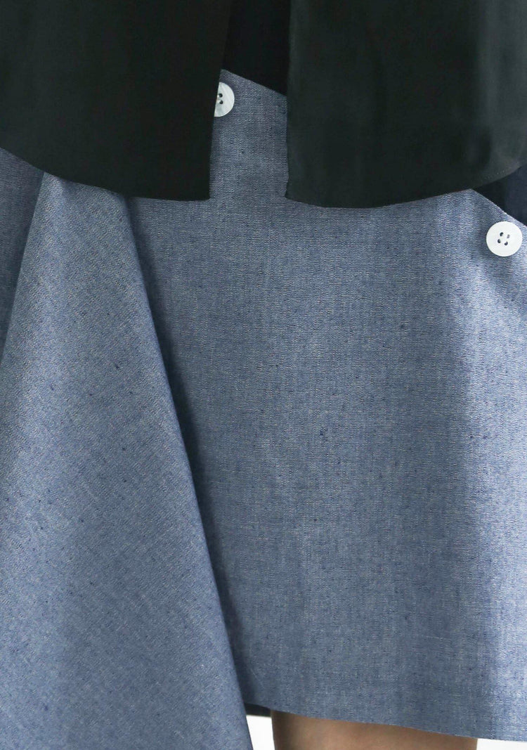 RAVELLO BACK DRAPED BUTTON DETAIL SKIRT IN NAVY CLOUD - SALIENT LABEL
