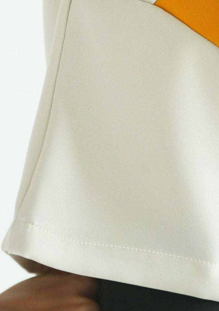 IRMA ANGLED TOP- BAND OF GOLD - SALIENT LABEL