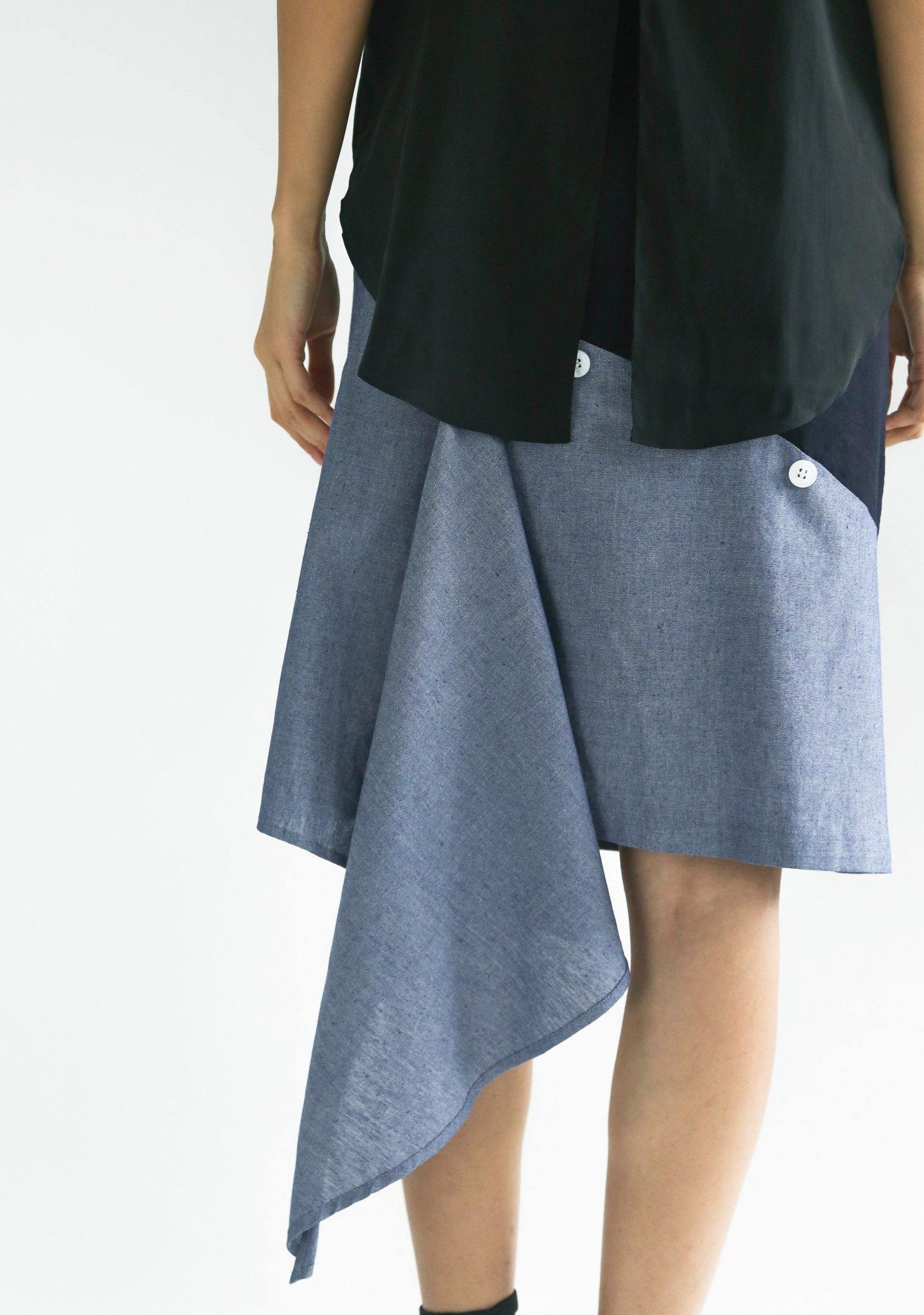 RAVELLO BACK DRAPED BUTTON DETAIL SKIRT IN NAVY CLOUD - SALIENT LABEL